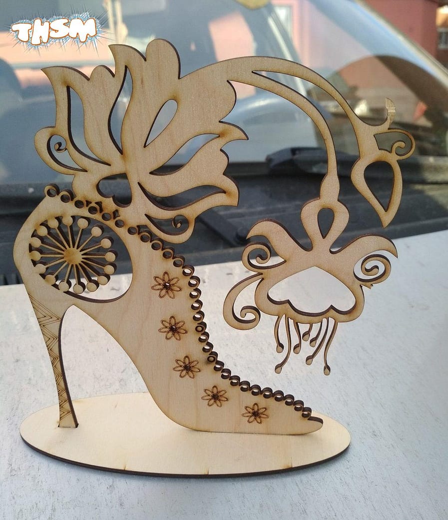 Laser Cut Shoe Shaped Jewelry Stand Free Vector
