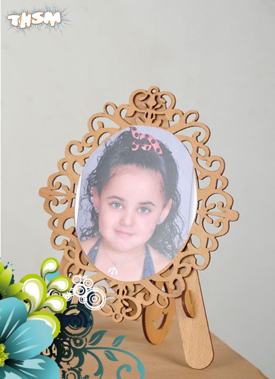 Laser Cut Decorative Photo Frame With Stand Free Vector